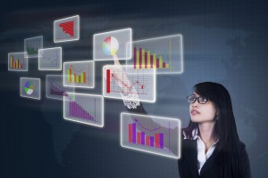 Success businesswoman choosing one of different types of diagrams in virtual future interface